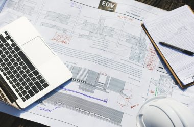 An engineering workspace with a laptop